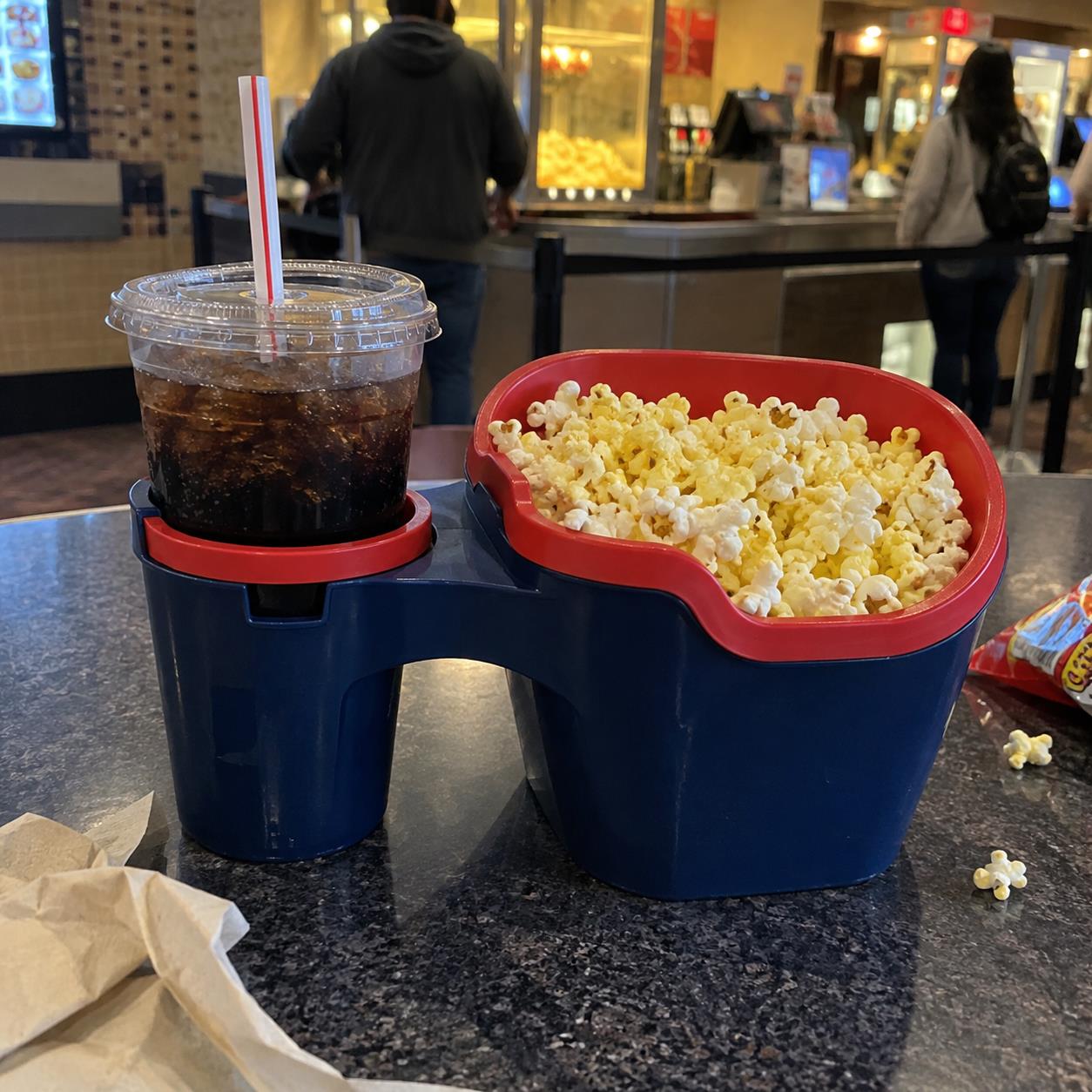 Illustrative concept of Popcorn and Drink Carrier